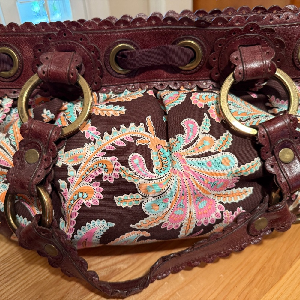 Isabella Fiore gorgeous colors and  amazing  leather work…detailed beading.